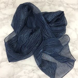 Navy semi-sheer scarf with wavy stripe print